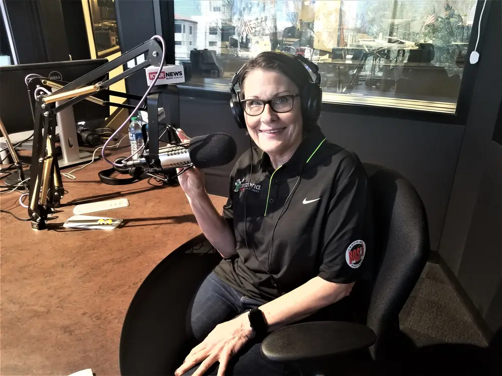 Becky Derendal in the radio studio as a Rosie on the House partner